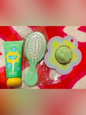 Vanilla Dream Hand Cream & Mint Hair Brush with a daise lip balm